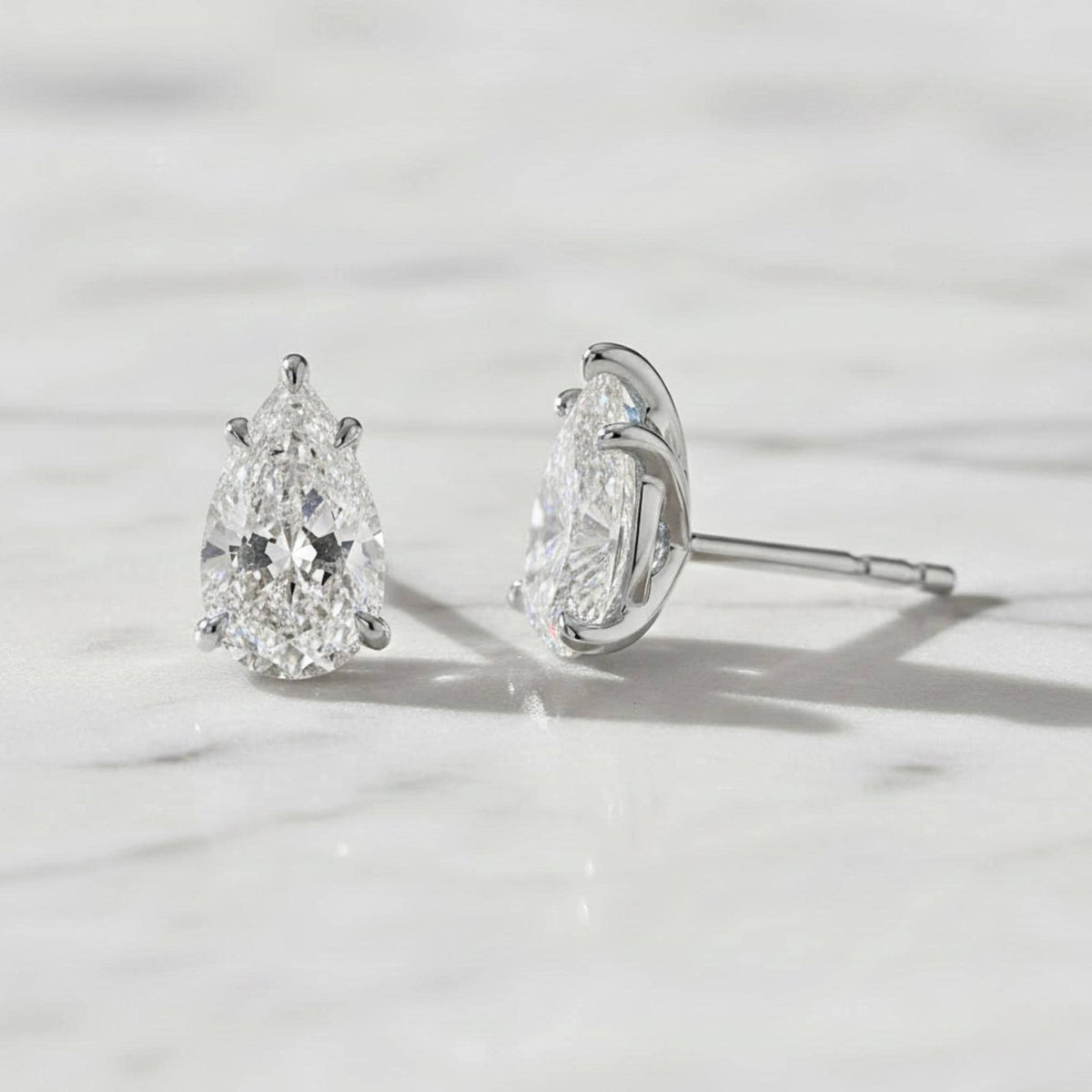 5 Carat Pear Cut Moissanite Diamond Stud Earrings: 14K Yellow Gold