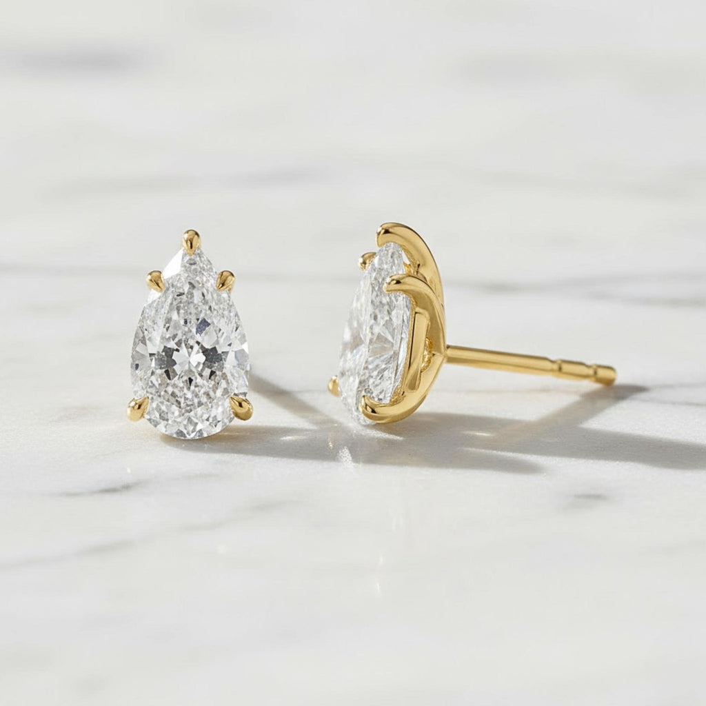 5 Carat Pear Cut Moissanite Diamond Stud Earrings: 14K Yellow Gold
