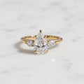 1.50ct Pear Cut Moissanite Ring, Petite Three Stone Engagement Ring, 14K Solid Gold Dainty Minimalist Jewelry, Pear Side Stone Promise Ring